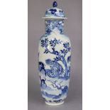 An 18th century Chinese blue & white porcelain tall ovoid vase & cover, decorated with numerous