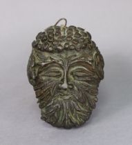 A 19th century cast-iron ‘Green Man’ small hanging wall mask, impressed marks “CM3” to reverse, 13cm