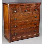 An early Victorian figured mahogany chest in two sections, fitted three short & three long ash-lined