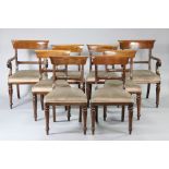 A set of eight William IV mahogany bow-back dining chairs with padded seats & carved, & turned