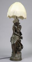 A large composition figural table lamp after a model by Moreau, 64cm high, with shade (90cm high