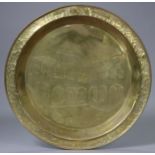 A very large brass alms dish, embossed with “The Residency, Warri” (Nigeria), & the name “Mrs A