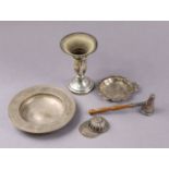 A modern silver ‘Armada’ dish, 11cm diam., London 1988 (3 oz); a Jockey cap caddy spoon, Sheffield
