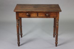 A Victorian mahogany side table with rounded corners to the rectangular top, fitted two frieze draw