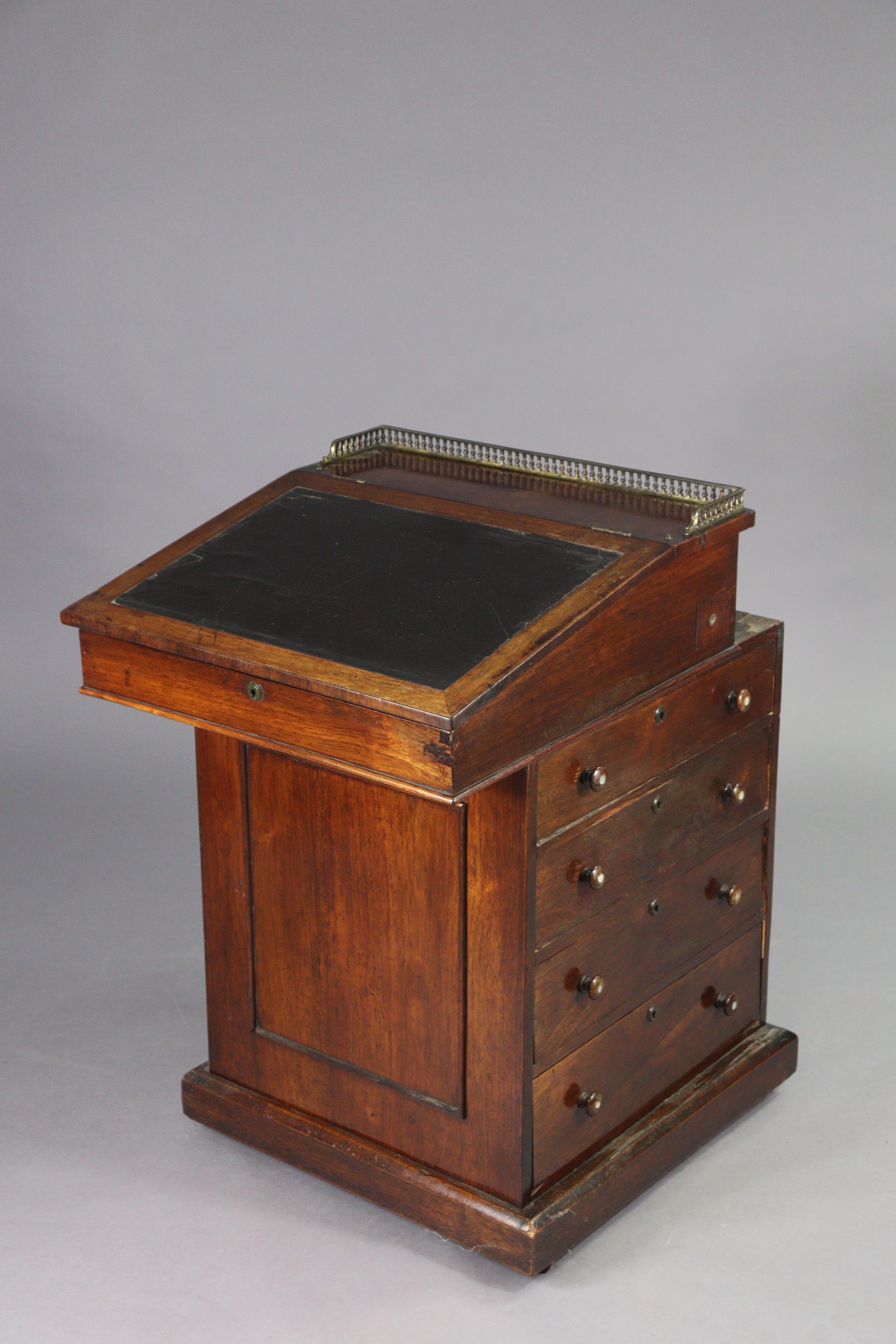 An early 19th century rosewood davenport, the forward-sliding top with brass gallery & long hinged - Image 8 of 9