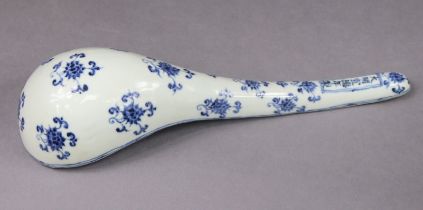 A Chinese blue & white glazed large stoneware spoon, the deep bowl & dished stem with sun skirt