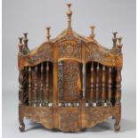 An 18th century French provincial walnut bread cabinet, carved floral decoration, spindle