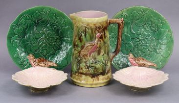 A pair of Minton-type majolica shell-shaped dishes with cranes, 21cm; & a pair of leaf-moulded green