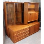 A G-Plan teak inter-changeable tall wall unit fitted with an arrangement of cupboards, drawers,