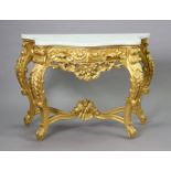 A 19th century-style giltwood serpentine-front console table with a white marble top, fitted