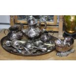 A silver-plated nautilus shell spoon warmer; a plated three-piece tea service; a plated oval tea