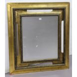 A 19th century-style large gilt frame rectangular wall mirror with a rope-twist border & inset