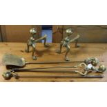A pair of brass firedogs with claw-ball terminals, 24.5cm high; & a ditto set of three fire-