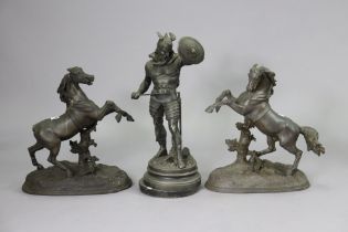 Two Spelter Marley horse ornaments, 50cm high; & a Spelter warrior figure, 56cm high (w.a.f.).