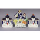 A pair of 19thC Staffordshire pottery models of cottages, each 16.5cm high x 13cm wide; & a ditto