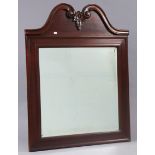 A mahogany-frame rectangular wall mirror with a swan-neck surmount, & inset with a bevelled plate,