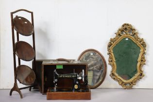 A Singer hand sewing machine with case; together with a folding cake stand; & two small wall