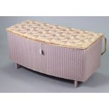 A Lusty’s Lloyd Loom pink painted bow-front blanket box with a hinged lift-lid, 90.5cm wide.