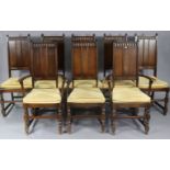 A set of eight Ercol oak dining chairs (including a pair of carvers), each with a panelled back, &