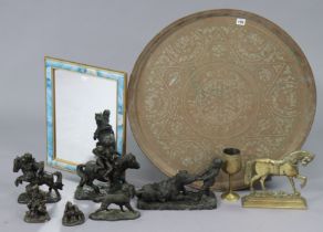 An eastern brass engraved circular tray, 72cm diameter; a brass “horse” door porter; a brass