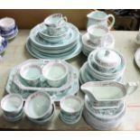 Sixty-four items of Adams ironstone china “Singapore Bird” dinner & teaware.
