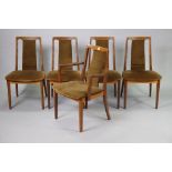 A set of five G-Plan teak dining chairs (including one carver) each with a padded seat, & on