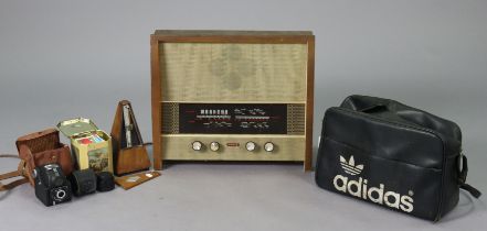 A vintage Maelzel metronome in a mahogany case, 22.5cm high; a vintage Murphy valve radio (Type A.