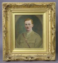 An early 20th century head & shoulders portrait of a British WWI soldier wearing dress uniform (