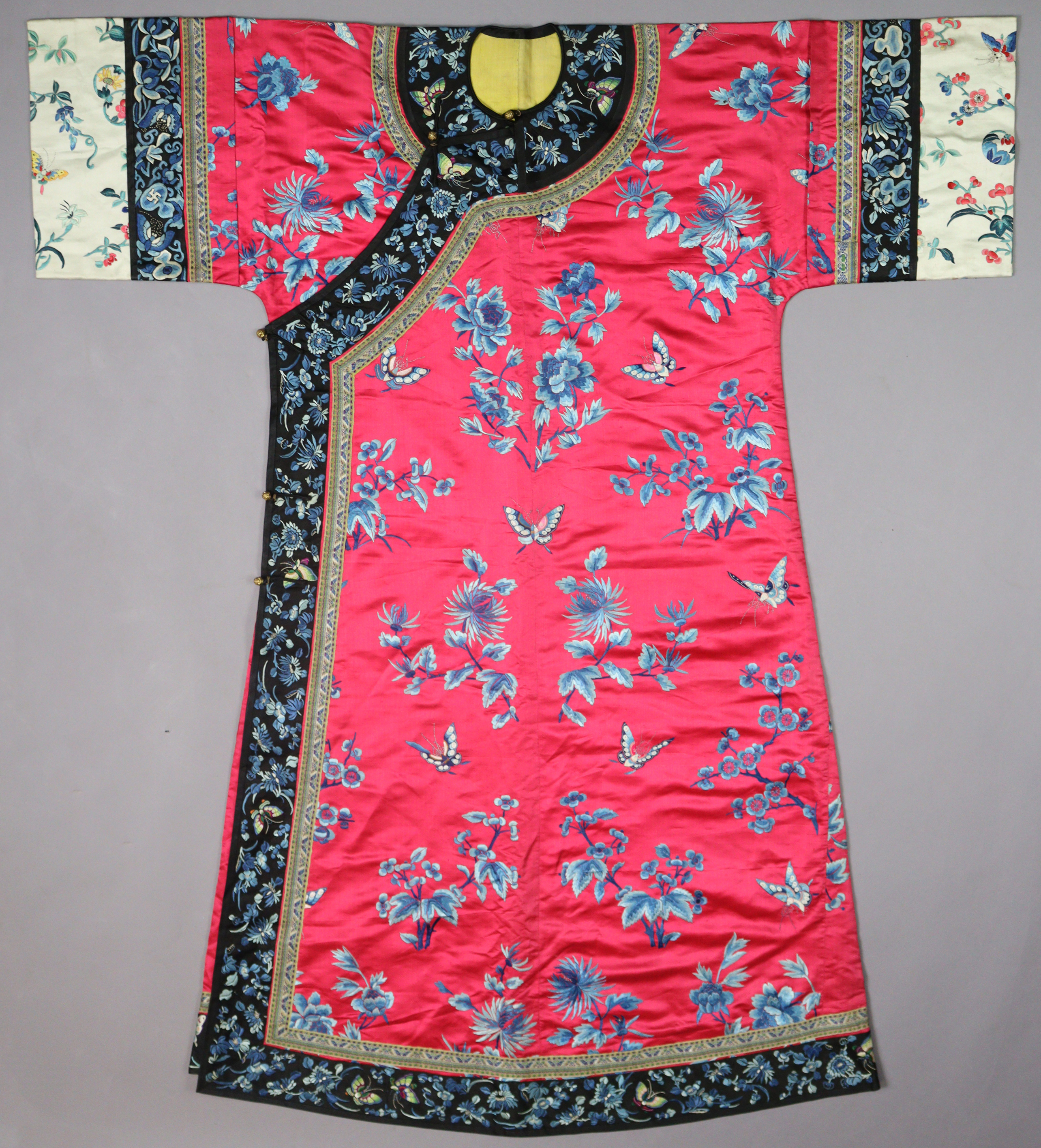 A LATE 19th CENTURY CHINESE SILK INFORMAL LADY’S ROBE, of pink ground with all-over embroidered