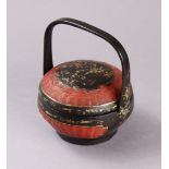 A Chinese black & red lacquered wedding basket with gilt decoration & overhang handle, 17cm high x