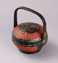 A Chinese black & red lacquered wedding basket with gilt decoration & overhang handle, 17cm high x