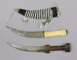 Two Eastern hunting knives, each with sheath, 30.5cm & 29cm long.