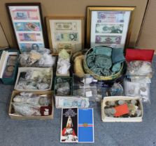 A large quantity of British & foreign coins, framed banknotes, commemorative crowns, etc.