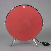 A Vintage Sofono “flying saucer” space heater in a crimson finish & chrome-plated case (for