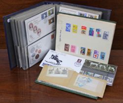 An album & contents of GB & foreign stamps; & another containing 88 mostly GB First Day & other