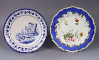 An 18th/19th century Dutch delft 22cm diam. plate painted in blue with figures in a cart, in