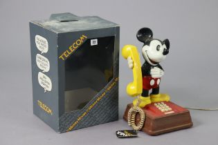 A Telecom novelty “Mickey Mouse” telephone, boxed.