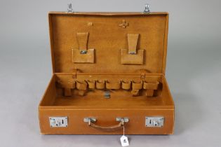 A vintage tan leather vanity case fitted chrome twin-lever locks, 61cm wide.