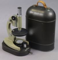 A 1970’s Russian monocular field microscope, with case.