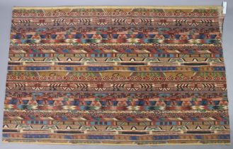 A length of Liberty’s of London "Zebak" fabric upholstery of multi-coloured geometric design, 452cm