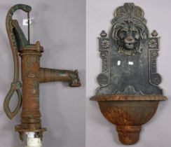 A Victorian-style cast-iron water pump, 62cm high; & a similar wall-mounted water feature, 77cm x