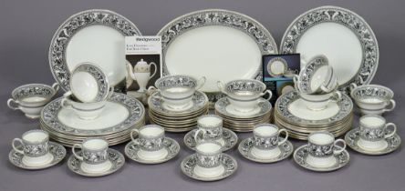 A Wedgewood bone china “Florentine” fifty-piece part dinner & coffee service.