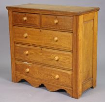 An oak chest fitted two short & three long graduated drawers with turned knob handles, 105cm wide