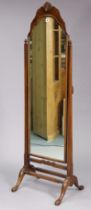 A Queen Anne-style mahogany rectangular cheval mirror with shell motif to the rounded top, & on