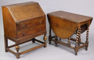 A 1930’s oak oval gate-leg dining table on barley-twist legs & turned feet with plain stretchers,