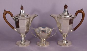A George V silver café au lait set of eight-sided vase shape comprising a coffee pot and hot-milk
