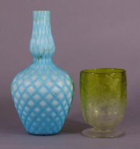 A Victorian pale-green tinted ovoid glass with moulded decoration of butterflies & foliage, on round