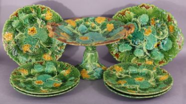 A late 19th/early 20th century English majolica Nasturtium pattern moulded pottery part dinner