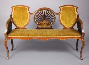 A late Victorian inlaid mahogany show-wood sofa, with shaped back and arms, upholstered gold velour,