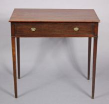 A George III mahogany side table with plain rectangular top, fitted frieze drawer with small oval